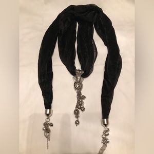 Black scarf with jewelry